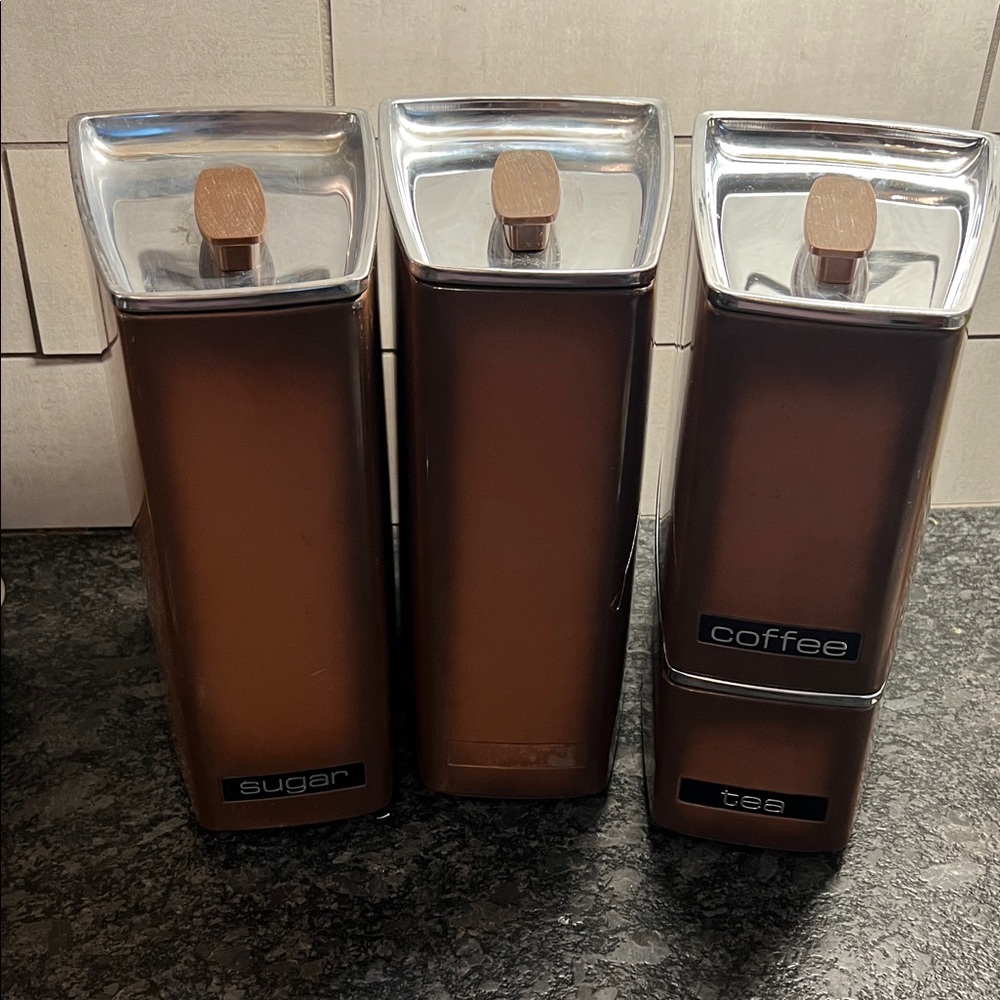Lincoln Beauty ware MCM   Kitchen Canister Set in brown and chrome. Wood handles
